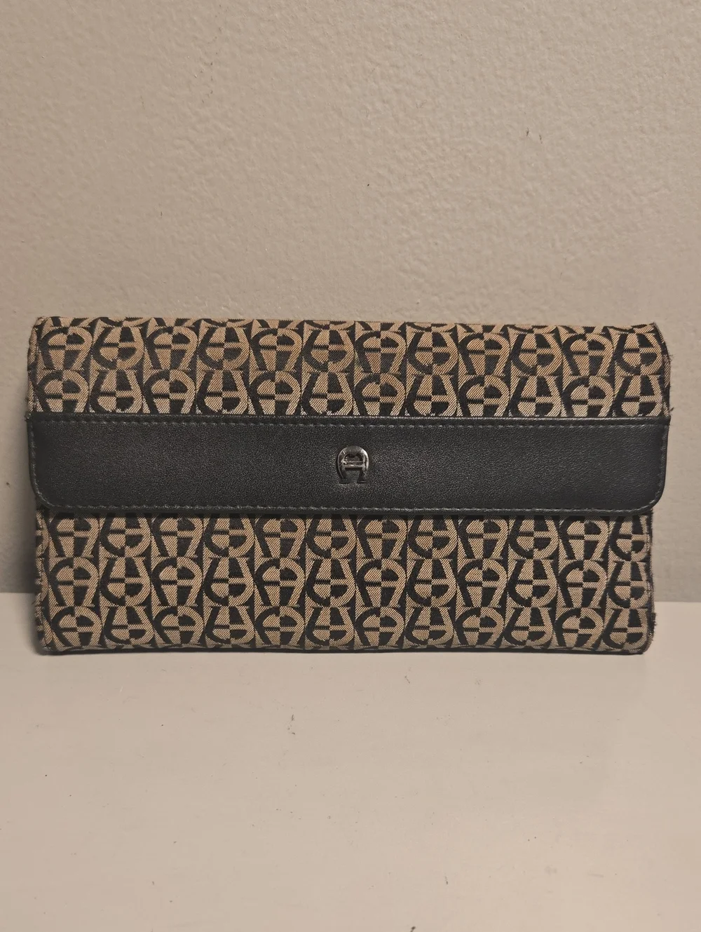 Etienne Aigner Patterned Monogram Clutch in Beige and Black